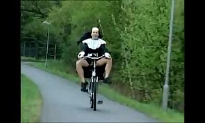 Nun on high bike.wmv